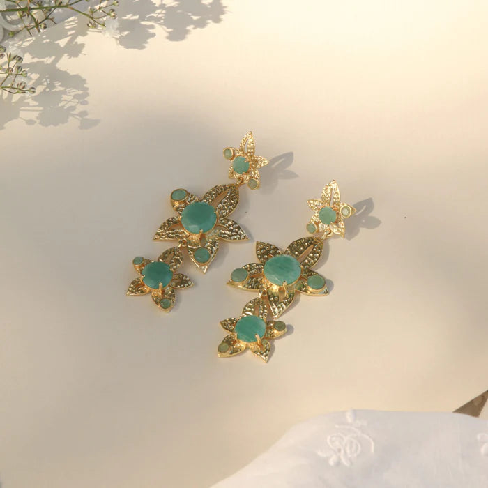 OPULENT EMERALD DROP EARRINGS Opulent, flower-shaped Amazonite drop earrings that are simply stunning. The perfect wardrobe addition that will easily transition from day to night.Designer earrings. Pamamull.com